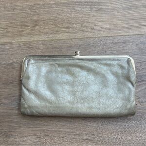 Stunning Hobo International Lauren Clutch Wallet Champagne Gold metallic leather